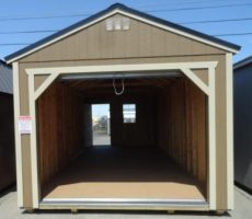 Old Hickory Sheds 12'x24' Utility Garage Painted Buckskin with Metal Roof Door View
